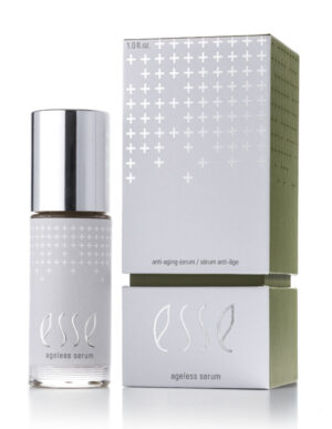 The Esse Ageless Serum, topped with a silver cap, is shown beside its white and green box. Both the bottle and box feature silver cross patterns and minimalist text.