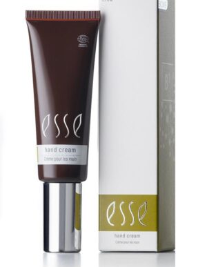 An Esse Hand Cream tube is positioned next to its corresponding box. The cream's tube is brown with a silver cap, featuring the "Esse Hand Cream" text in white. The box shares similar branding and colors, with additional product information.