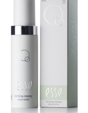An image of the Esse Clarifying Cleanser, a skincare product in a sleek white bottle with a silver cap, is presented alongside its matching white and light green packaging box. Both the bottle and box showcase simple, minimalist design elements.