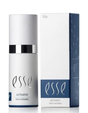 A 1.0 fl.oz. bottle of Esse Activator, elegantly designed with a silver accent, is displayed next to its matching white and blue box packaging featuring the same branding and the text "R17" on the side.