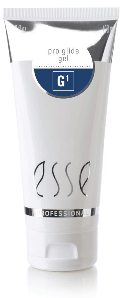 A white tube labeled "esse PROFESSIONAL" with "pro glide gel G1" on a blue and white sticker near the top. The tube has a flip cap at the bottom.